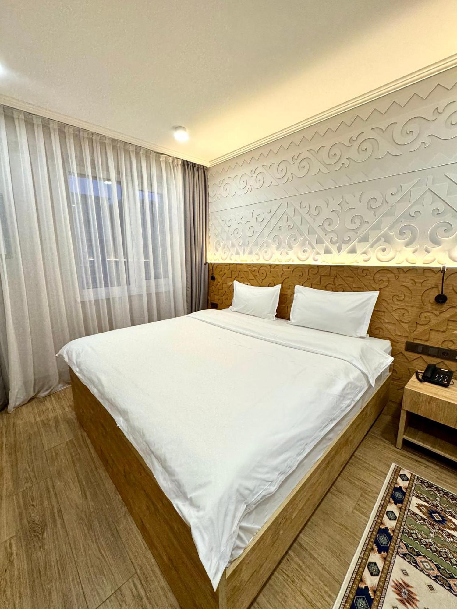 Dami Almaty Hotel Exterior foto
